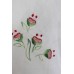 Red flowers in white organdy